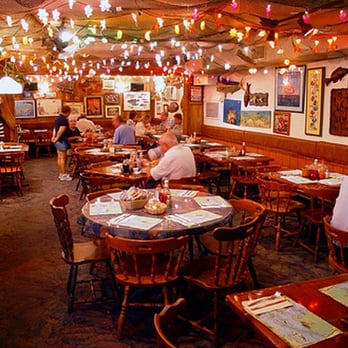 The Fish House - Funky interior with fish nets, colored lights, and interesting nautical items on the walls. - Seafood Near Me - Key Largo, Florida The Fish House - Funky interior with fish nets, colored lights, and interesting nautical items on the walls. - Seafood Near Me - Key Largo, Florida