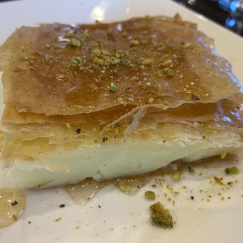 Nick's Taverna - Galaktoboureko (Greek custard pie with syrup) - Mediterranean Near Me - Ashburn, Virginia Nick's Taverna - Galaktoboureko (Greek custard pie with syrup) - Mediterranean Near Me - Ashburn, Virginia