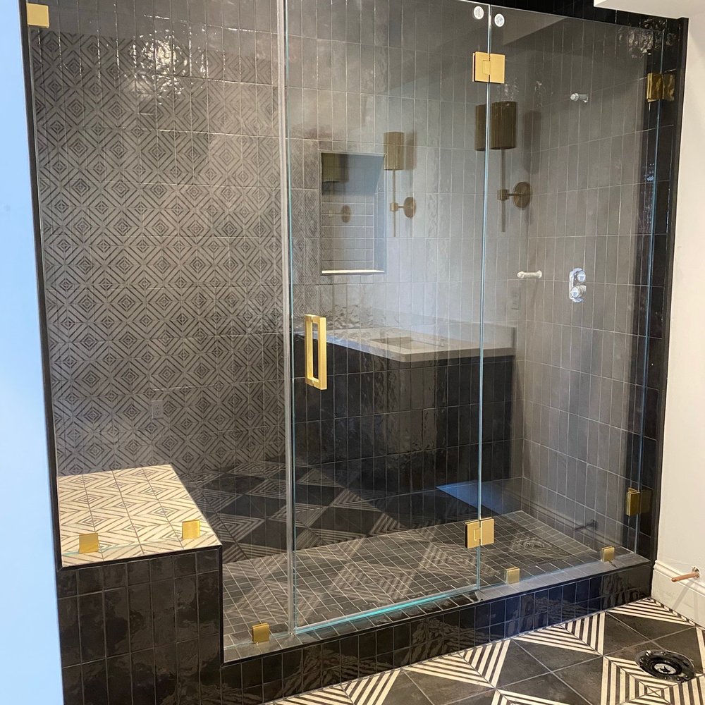 J's Custom Glass - Frameless ultra clear glass shower door with brass hardware - Windows Installation Near Me J's Custom Glass - Frameless ultra clear glass shower door with brass hardware - Windows Installation Near Me