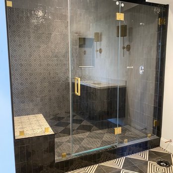 J's Custom Glass - Frameless ultra clear glass shower door with brass hardware - Windows Installation Near Me J's Custom Glass - Frameless ultra clear glass shower door with brass hardware - Windows Installation Near Me