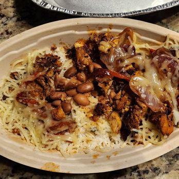 Chipotle Mexican Grill - Where are the extra fajita veggies? Or normal portion of chicken? And also this was put in the bag sideways - Fast Food Near Me - Southlake, Texas