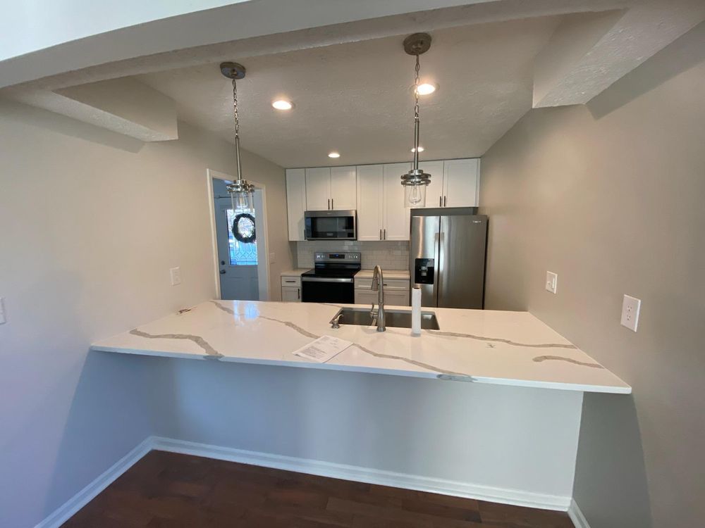 Slide of Home Experts Indy