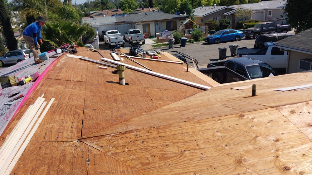 Slide of Tello's Roofing