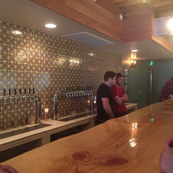 Piñon Bottle - Gorgeous hewn timber bar, antique-style tile bar back, and 40 (!) beer taps - Beer Bar Near Me - Reno, Nevada Piñon Bottle - Gorgeous hewn timber bar, antique-style tile bar back, and 40 (!) beer taps - Beer Bar Near Me - Reno, Nevada
