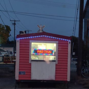 A THAIGER - a red building with a neon sign - Food Trucks Near Me - Hamilton, Montana A THAIGER - a red building with a neon sign - Food Trucks Near Me - Hamilton, Montana
