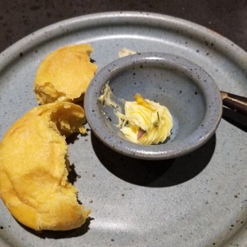 Nonesuch - A perfect sweet potato roll with fresh butter.  Loved it. - New American Near Me - Oklahoma City, Oklahoma