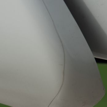 Bakersfield Tint - Nissan Frontier - Hack Job on trimming the edge of the film. - Home Window Tinting Near Me - Bakersfield, California