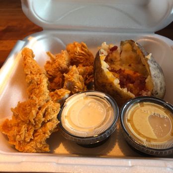 Cheddar's Scratch Kitchen - Chicken tenders and half eaten baked potato - American Near Me - Austin, Texas Cheddar's Scratch Kitchen - Chicken tenders and half eaten baked potato - American Near Me - Austin, Texas