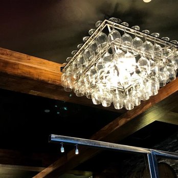 Biagio Wine And Spirits - a glass chandelier - Beer, Wine & Spirits Near Me - Dallas, Texas Biagio Wine And Spirits - a glass chandelier - Beer, Wine & Spirits Near Me - Dallas, Texas