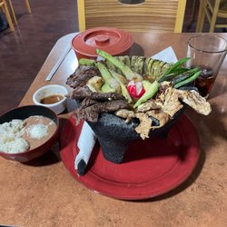 Safari Restaurant And Bar - This place is great. It's got parking and the food is good. I highly recommend, and it's brand new. It's only been up in six months.