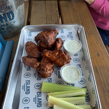 Island Cabana Bar - a tray of wings and celery - Salad Near Me - Charleston, South Carolina Island Cabana Bar - a tray of wings and celery - Salad Near Me - Charleston, South Carolina