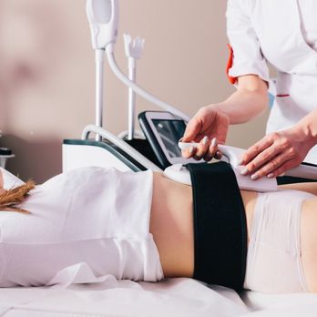 Comprehensive Medical Weight Loss - A healthcare professional performs a non-invasive body contouring or weight loss treatment on a patient lying comfortably in ... - Weight Loss Centers Near Me - Centennial, Colorado Comprehensive Medical Weight Loss - A healthcare professional performs a non-invasive body contouring or weight loss treatment on a patient lying comfortably in ... - Weight Loss Centers Near Me - Centennial, Colorado