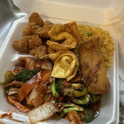 Lin Cuisine - Hunan chicken combo with sweet and sour chicken, an egg roll, and 2 cream cheese wontons
