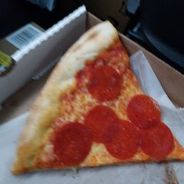 a slice of pepperoni pizza a slice of pepperoni pizza