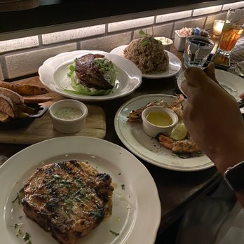 St. Anselm - Steak fries(rear left), salad and cauliflower (back row) Pork chop and monster prawn up front. - Steakhouses Near Me - Washington, DC, District of Columbia
