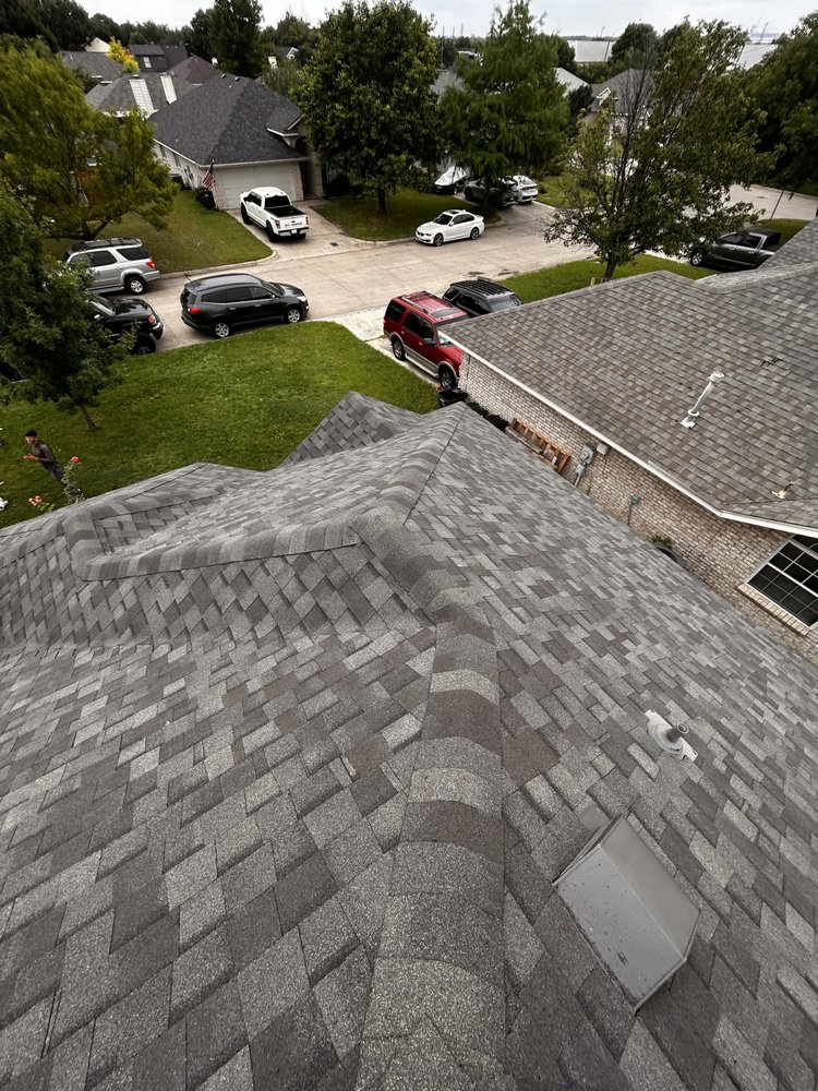 Slide of Homer’s Roofing & Construction