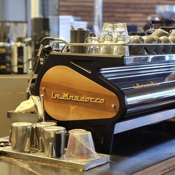 Chocolate Fish Coffee Roasters - a woman preparing a cup of coffee - Coffee & Tea Near Me - Sacramento, California Chocolate Fish Coffee Roasters - a woman preparing a cup of coffee - Coffee & Tea Near Me - Sacramento, California
