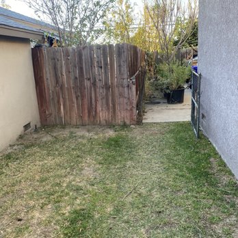 Perimeter Pros Fence - This is the before picture of the front where the gates were replaced. - Fences & Gates Near Me