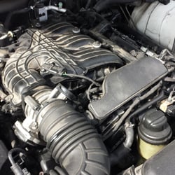 First Hyundai - The engine they ruined and didnt even put all back together....loose bolts laying around and engine cover is gone...not even in trunk