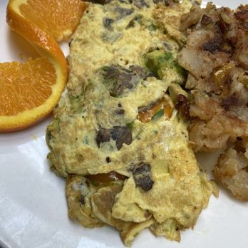 Green Kitchen - California Omelet: cheddar, avocados and mushrooms with home fries - Diners Near Me - New York, New York