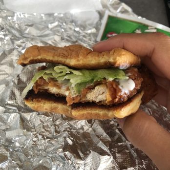 Gigi's Wings and Waffles - GiGi's Select Country Buttermilk Spicy Honey Crispy Chicken Cutlet Sandwich - Waffles Near Me - Brooklyn, New York Gigi's Wings and Waffles - GiGi's Select Country Buttermilk Spicy Honey Crispy Chicken Cutlet Sandwich - Waffles Near Me - Brooklyn, New York