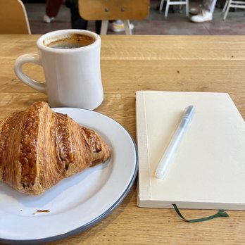 The Mill - Plain croissant and americano - Coffee & Tea Near Me - San Francisco, California The Mill - Plain croissant and americano - Coffee & Tea Near Me - San Francisco, California