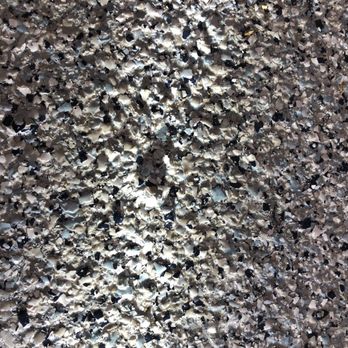 Encore Garage - A marble size protrusion casting a shadow - Flooring Near Me - East Dundee, Illinois