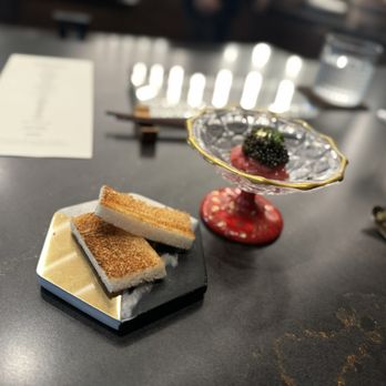 Kōsen - a plate of food on a table - Sushi Bars Near Me - Tampa, Florida