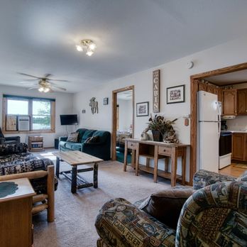 Northern Pines Resort - Living area in cabin - American Near Me - Butternut, Wisconsin Northern Pines Resort - Living area in cabin - American Near Me - Butternut, Wisconsin