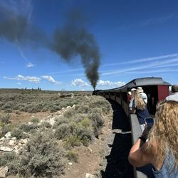 Cumbres & Toltec Scenic Railroad - The open car and the big engine rolling coal.