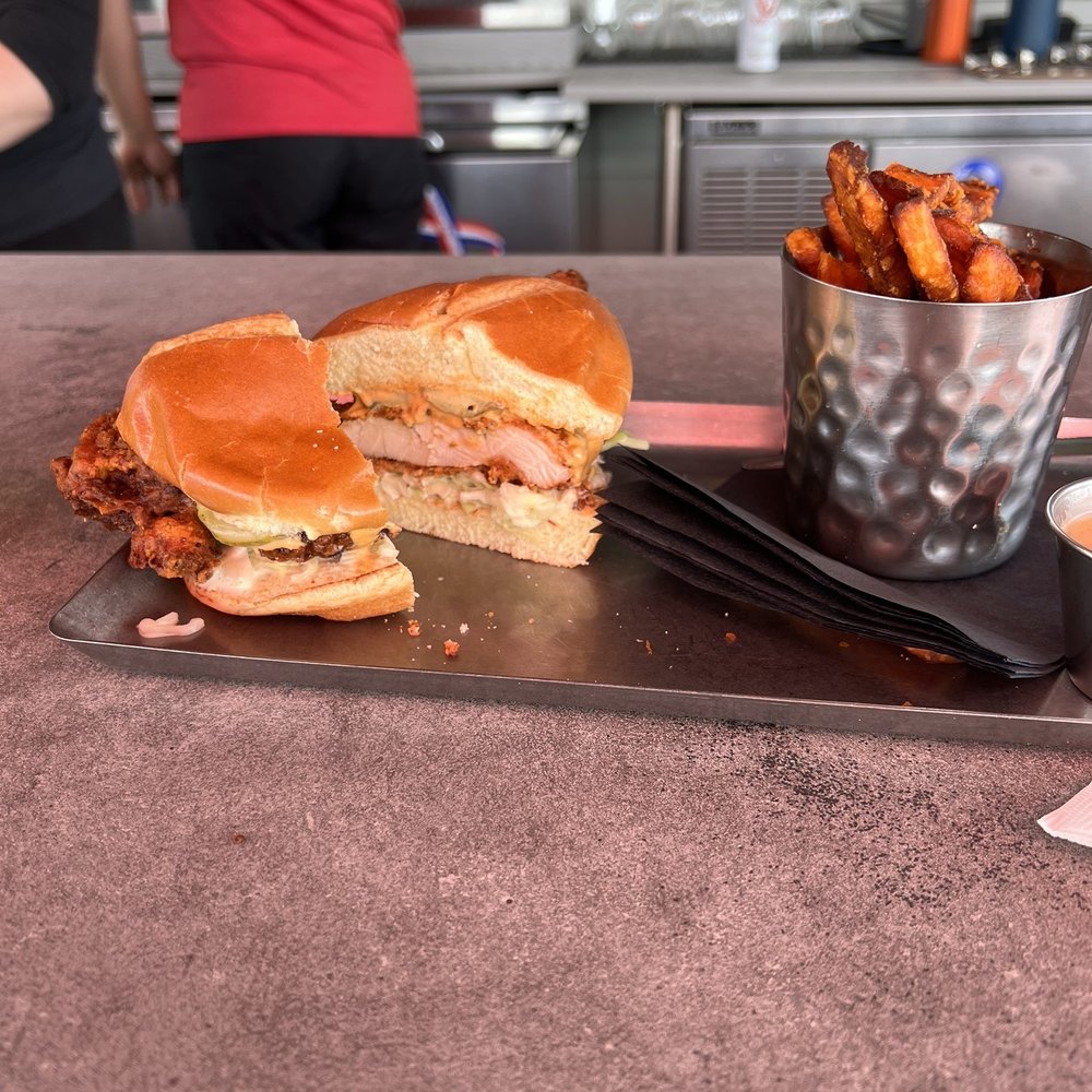 Sidewinders American Grill - Nashville chicken sandwich with very little heat. - Bars Near Me - Bozeman, Montana Sidewinders American Grill - Nashville chicken sandwich with very little heat. - Bars Near Me - Bozeman, Montana