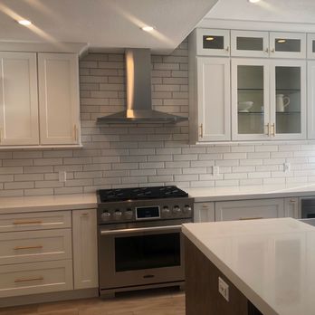 Premium Cabinets - After! New cabinets, island, stove/hood, and lighting. Better use of space and a happier home! - Cabinetry Near Me - Oceanside, California