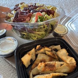 Rustica Salad, Side of Caesar Dressing, Extra side of wood-fired salad bread Rustica Salad, Side of Caesar Dressing, Extra side of wood-fired salad bread