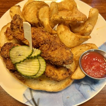 A.K.A Kitchen  - Open faced Nashville Hot Chicken with fries... Best fries I've ever had. Hands down. - New American Near Me - Loveland, Colorado