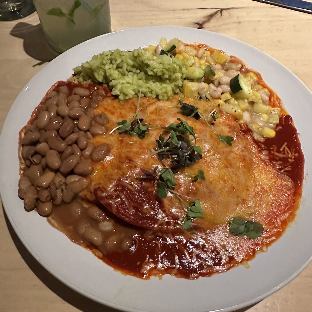 Blue Heron Restaurant - Open face pulled chicken enchiladas with red sauce. - New American Near Me - Santa Fe, New Mexico Blue Heron Restaurant - Open face pulled chicken enchiladas with red sauce. - New American Near Me - Santa Fe, New Mexico