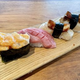 Spicy chopped scallop, otoro nigiri, and foie gras and scallop nigiri
