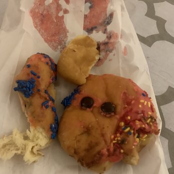 Yummy Donuts - You can see the frosting from the inside saturated through the bag. Broken puppy head that my kindergarten child received. - Donuts Near Me - Yukon, Oklahoma Yummy Donuts - You can see the frosting from the inside saturated through the bag. Broken puppy head that my kindergarten child received. - Donuts Near Me - Yukon, Oklahoma