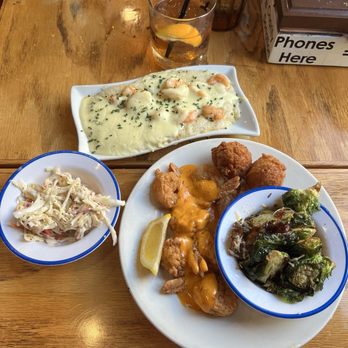 Hyman's Seafood - Build your own platter - shrimp and grits and boom boom shrimp with Cole slaw and bourbon glazed brussel sprouts - Seafood Near Me - Charleston, South Carolina