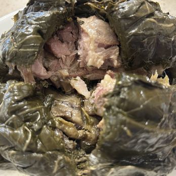 Young's Fish Market - Cross section of pork lau lau - Hawaiian Near Me - Honolulu, Hawaii