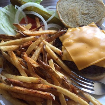 Sit N Bull Saloon - How the burger and fries were served. Grilly flavor but iffy meat quality. Fries were good, not amazing. - American Near Me - Indian Hills, Colorado