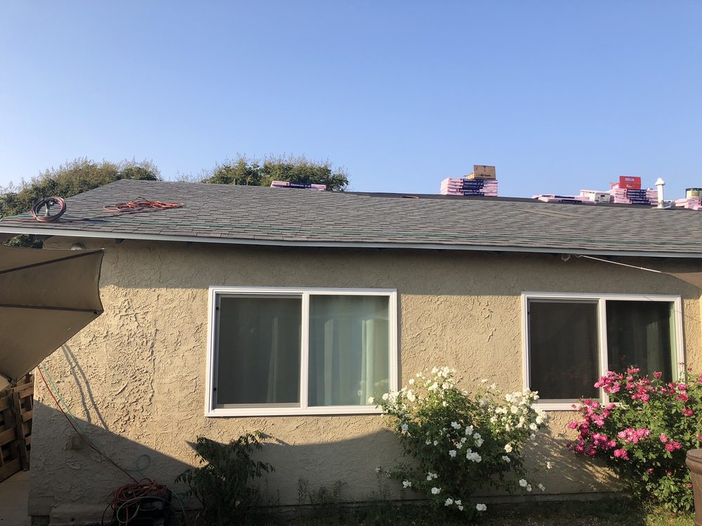 Slide of Patriot Custom Roofing