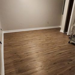 Sky Blue Contractors Inc - The after, framing, drywall, panting and floor all done.