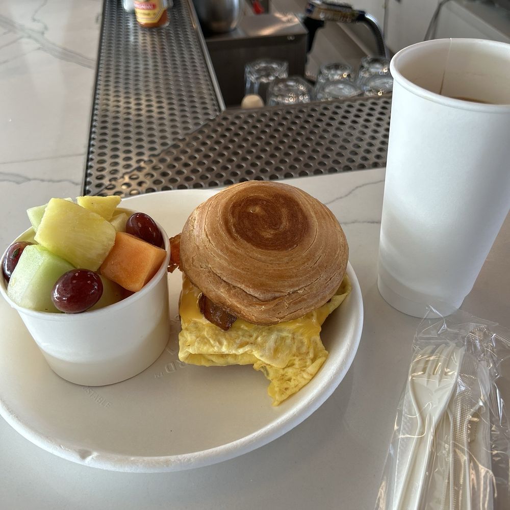 Breakfast sandwich. Bun is a croissant. Unbelievable. HUGE fruit cup included. Breakfast sandwich. Bun is a croissant. Unbelievable. HUGE fruit cup included.