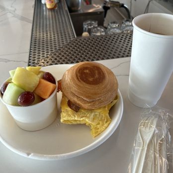 The Hampton Social - Breakfast sandwich. Bun is a croissant. Unbelievable. HUGE fruit cup included. - Breakfast & Brunch Near Me - Chicago, Illinois