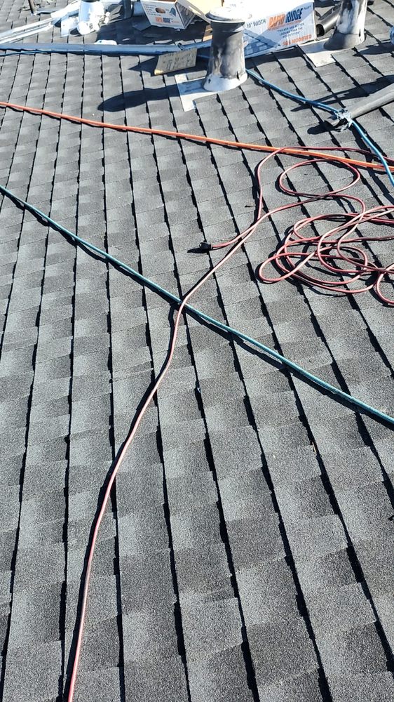 Slide of Ardons Roofing