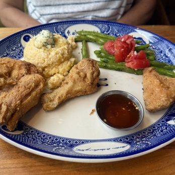 Founding Farmers Reston Station - Hot Honey Fried Chicken:  cheesy cheddar grits, green beans, marinated tomatoes. - Breakfast & Brunch Near Me - Reston, Virginia