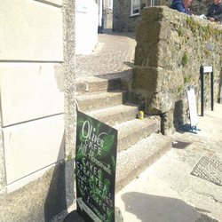 Olive's Cafe - Sign for Olive's Cafe on Wharf Road, go up the stairs and follow the road