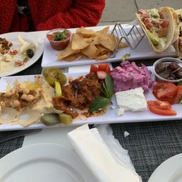 Photo of Serra's Dine & Dance - Studio City, CA, United States. (3) fish tacos and the Mediterranean Appetizer plate. Delicious and perfect with the day drinks.
