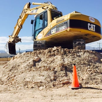 Dig This - Working the excavator in the dirt. - Amusement Parks Near Me - Las Vegas, Nevada