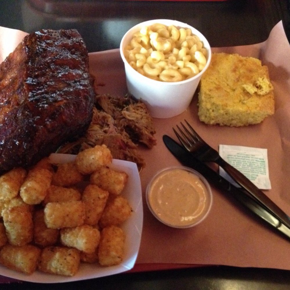 Ribs and pulled pork with a few sides. Ribs and pulled pork with a few sides.